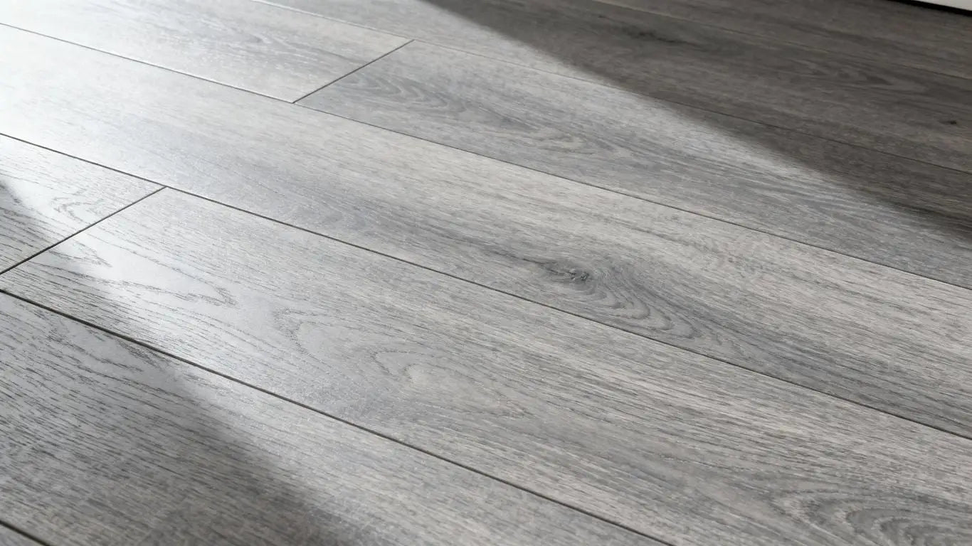 Modern linear grey wood-look flooring in a living room.