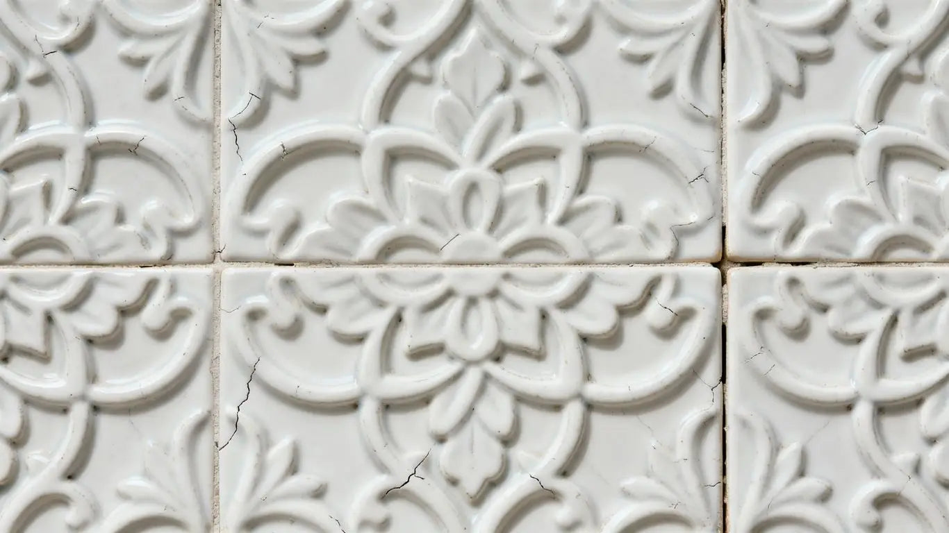 White Arabesque tiles with intricate patterns.