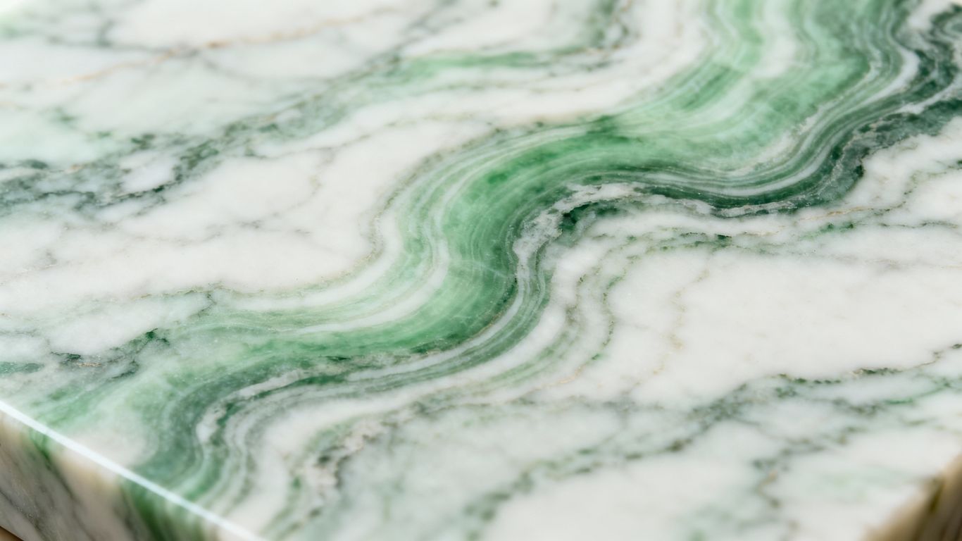 Polished Ming Green marble with natural green and white veining.