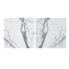 Two slabs of Arabescato Corchia Elite 12X12 Marble Tile with prominent grey veining