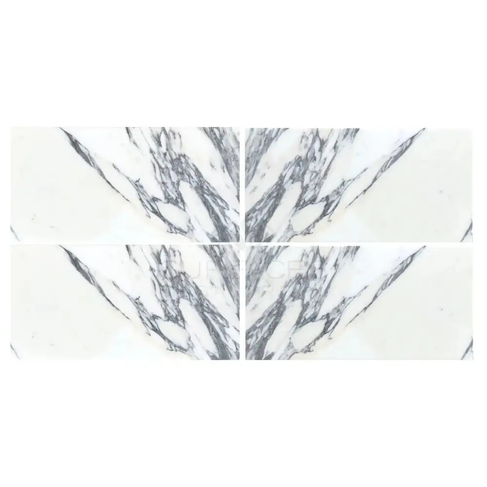 White marble tiles with bold gray veining in a book-matched pattern for Arabescato Corchia Elite 12X24 Marble Tile