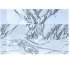 White marble tiles with prominent gray veining in Arabescato Corchia Elite 12X24 Marble Tile