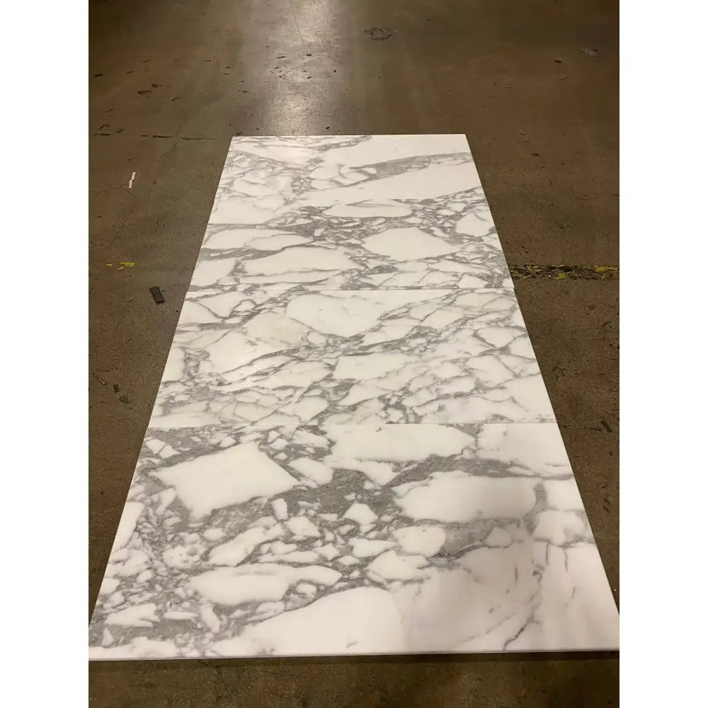 Rectangular Arabescato Corchia Elite 12X24 marble tile with white and grey natural veining