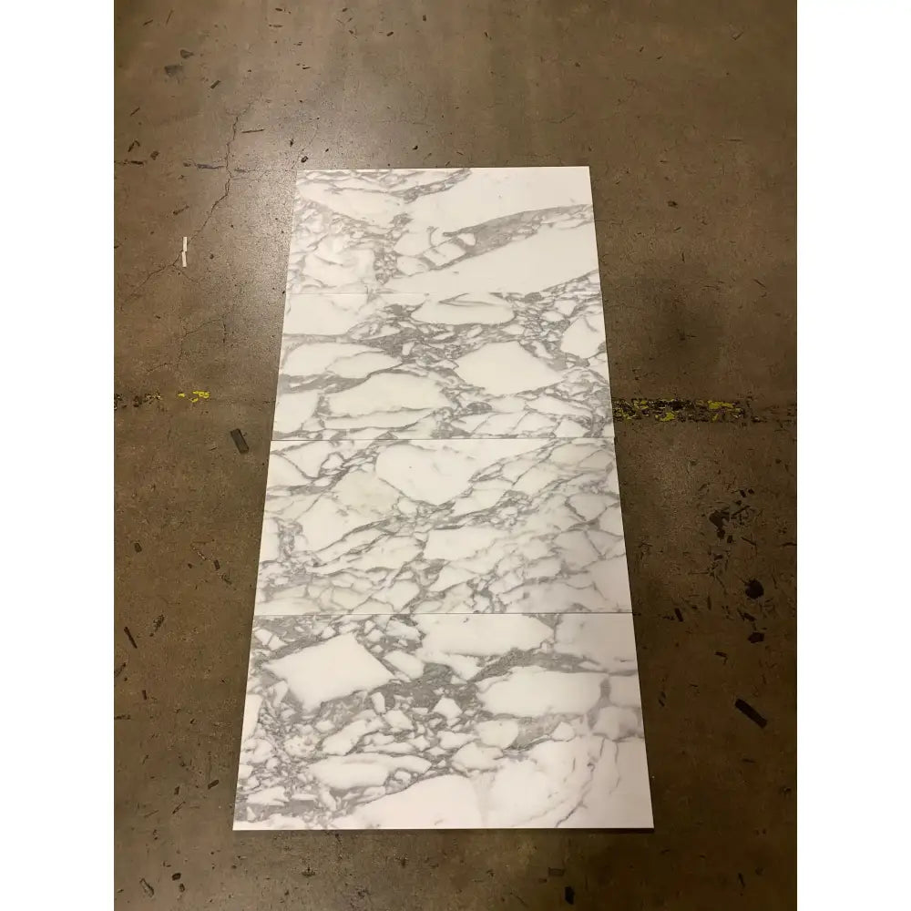 Rectangular Arabescato Corchia Elite 12X24 marble tile with gray veining and marble pattern