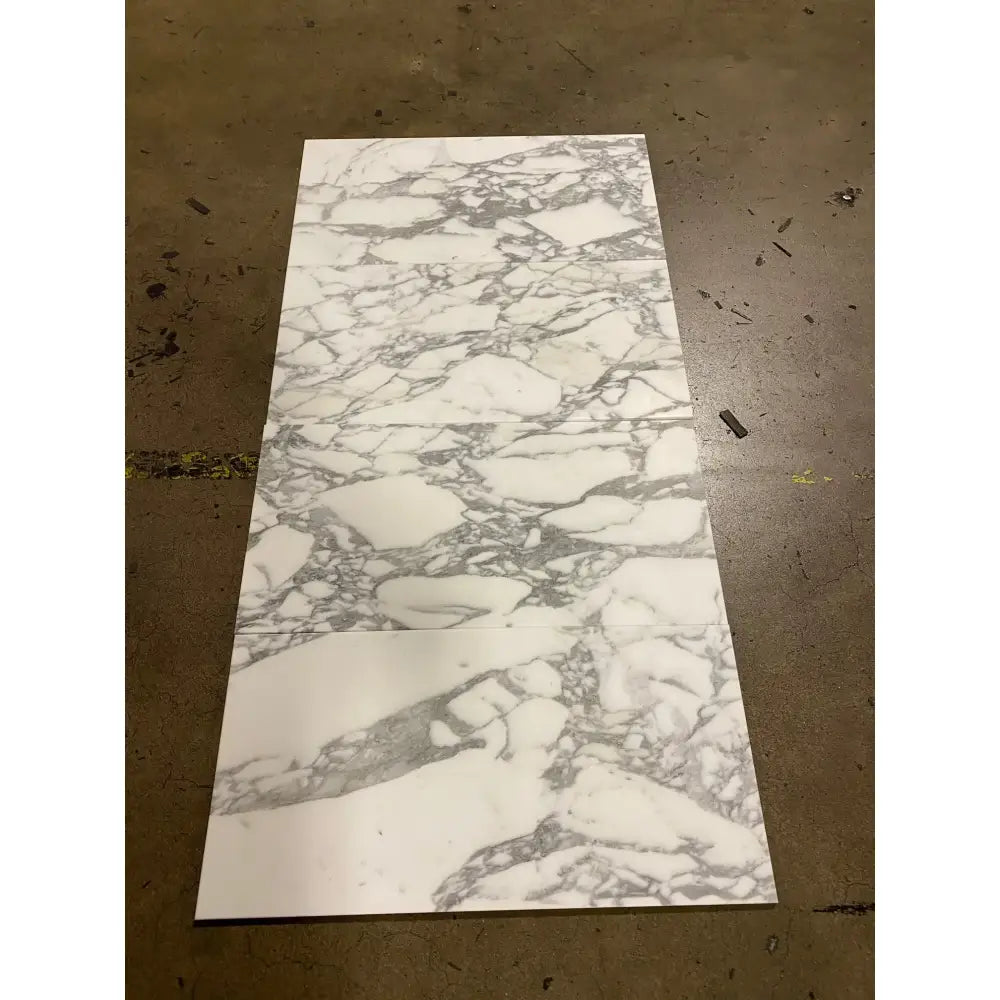 Arabescato Corchia Elite 24X24 Marble Tile with white marble slab and intricate gray veining