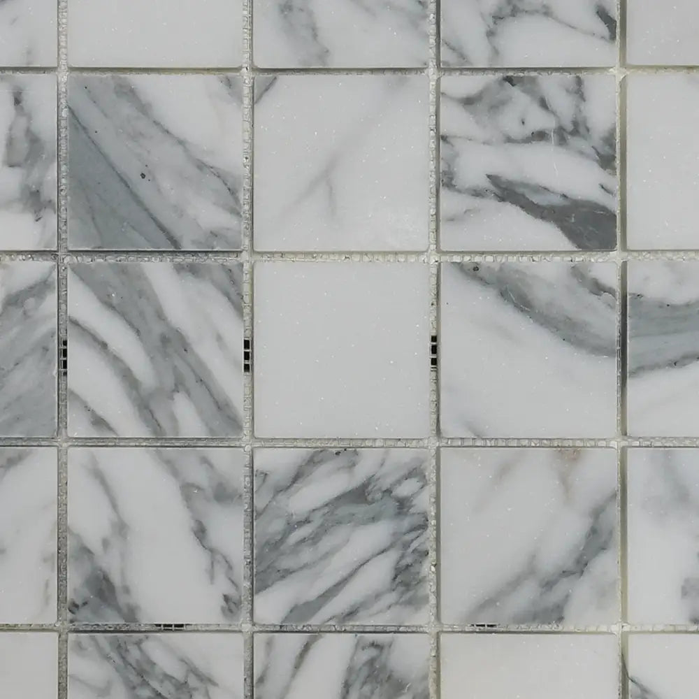 White marble mosaic tiles with grey veining in Arabescato Corchia Elite 2X2 pattern