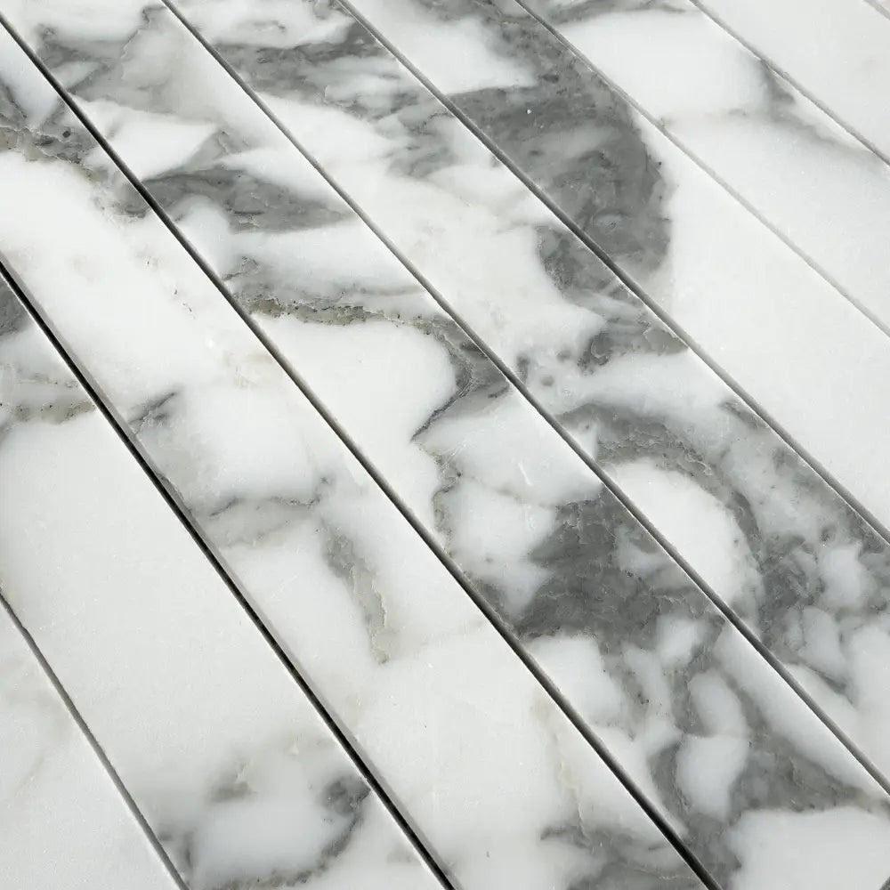 Marble tile strips from Arabescato Corchia Elite Corchia Marble mosaic display