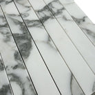 Marble-patterned rectangular tiles from Arabescato Corchia Elite Mosaic collection