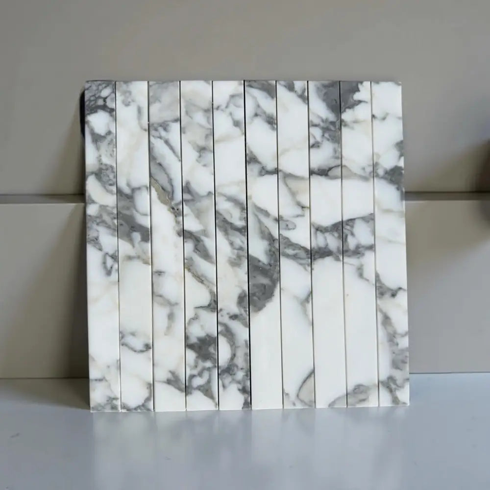 Marble-patterned tile strips from Arabescato Corchia Elite Corchia Marble Mosaic