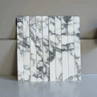 Marble-patterned tile strips from Arabescato Corchia Elite Corchia Marble Mosaic