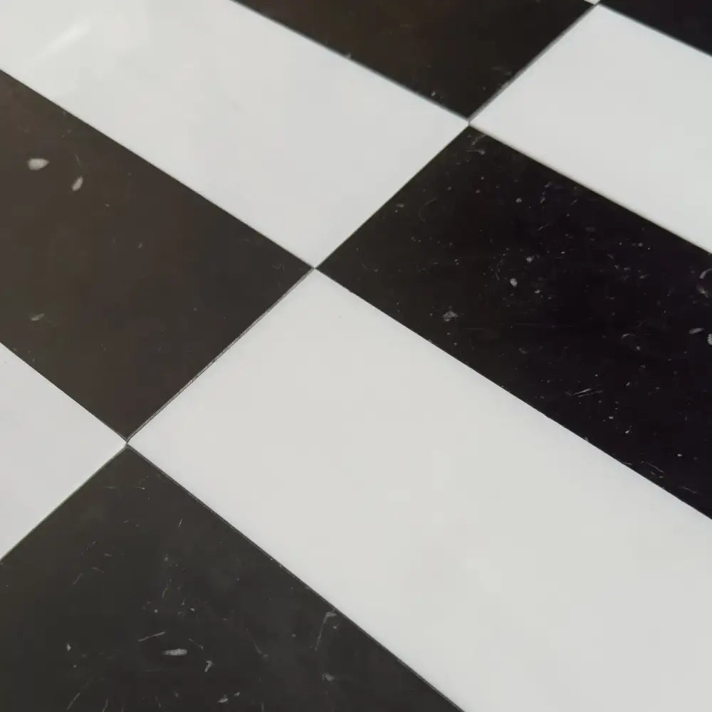Black and white checkered pattern from Arezzo in Bianco Dolomite and Nero Marquina 4X12 Set