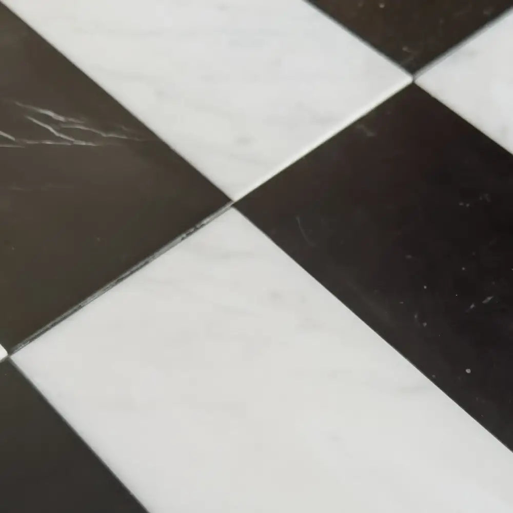 Black and white checkered tiles from Arezzo in Carrara White and Nero Marquina Prestige set