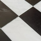 Black and white checkered tiles from Arezzo in Carrara White and Nero Marquina Prestige set