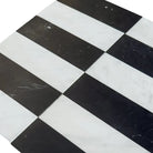 Black and white checkered tiles from Arezzo Carrara White Royale and Nero Marquina Prestige set