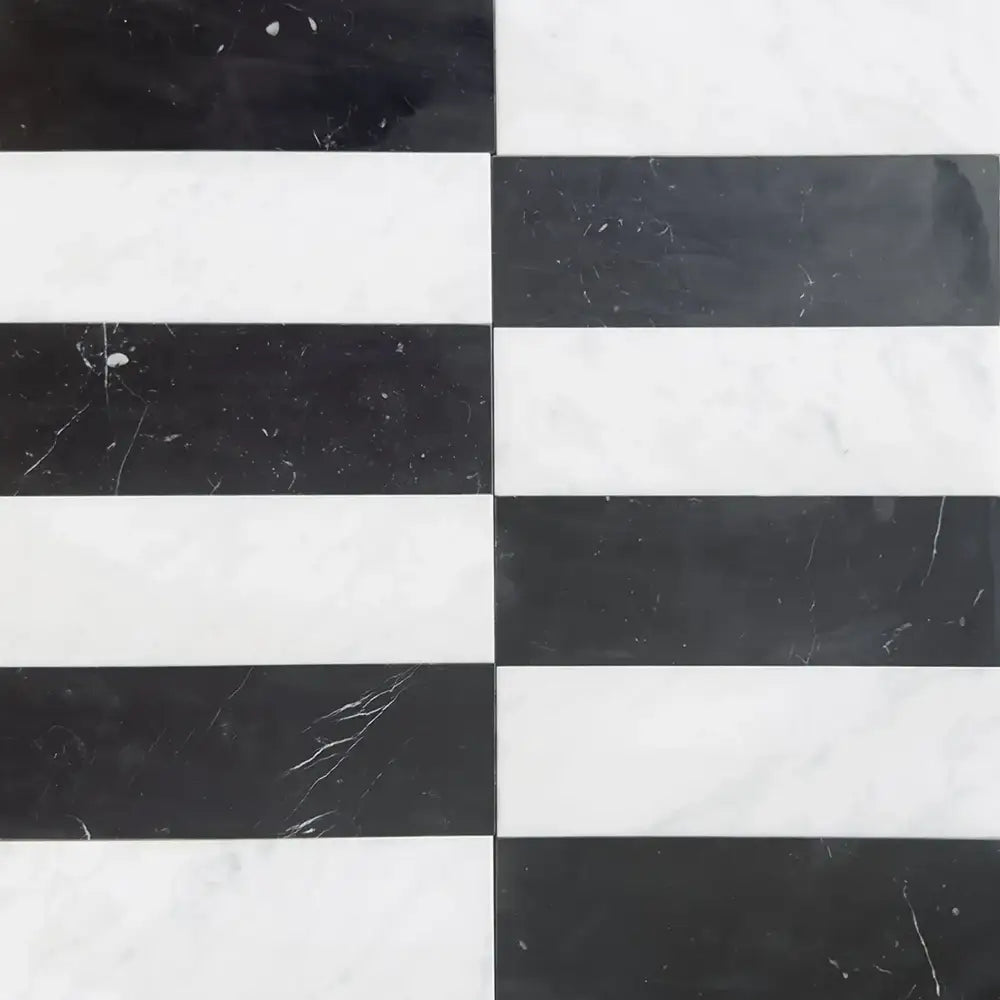 Black and white striped marble tiles from Arezzo in Carrara White Royale and Nero Marquina