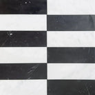 Black and white striped marble tiles from Arezzo in Carrara White Royale and Nero Marquina