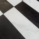 Black and white checkered floor tiles from Arezzo in Carrara White Royale and Nero Marquina Prestige 4X12 Set
