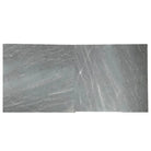 Two gray Bardiglio Prime Imperiale 12x12 marble tiles in a tumbled finish