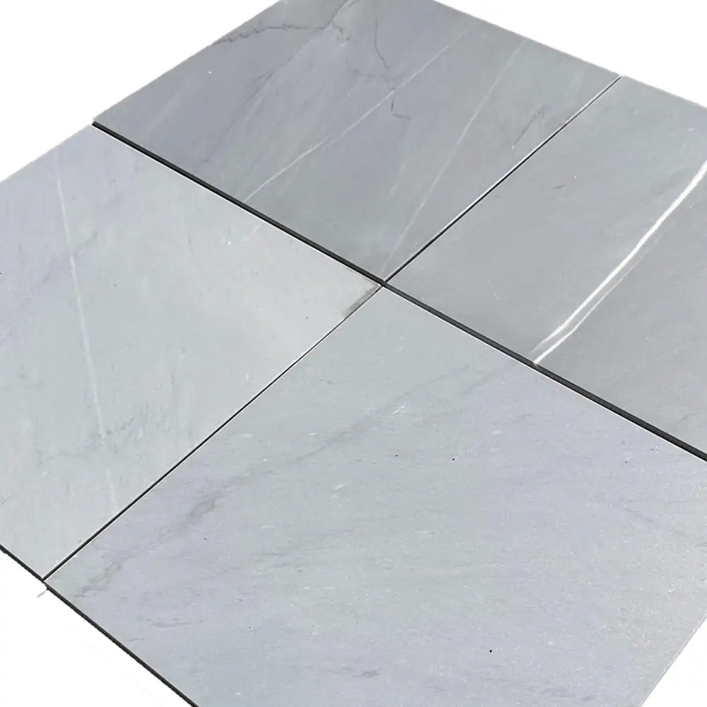 Four gray square Bardiglio Prime Imperiale marble tiles for polished or honed flooring