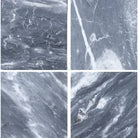 Four gray marble tiles from Bardiglio Prime Nuvolato 18X18 marble collection