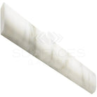 White marble pencil tile from Calacatta Gold Select for elegant backsplash or accent strip