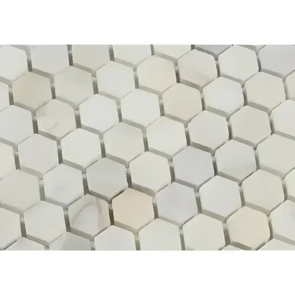 Hexagonal marble tile pattern featuring Calacatta Gold Select Mosaic Marble Tile
