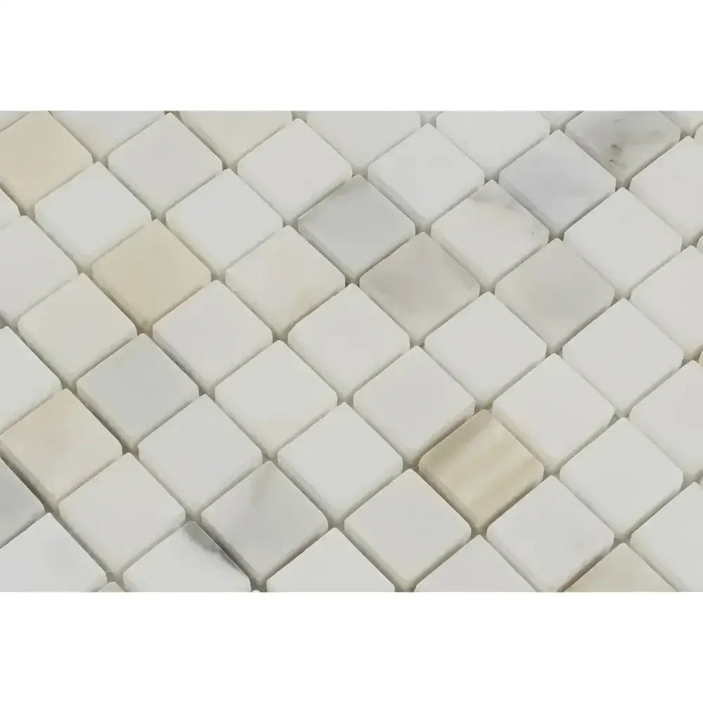 White diamond mosaic tile in Calacatta Gold Select marble for polished or honed finish