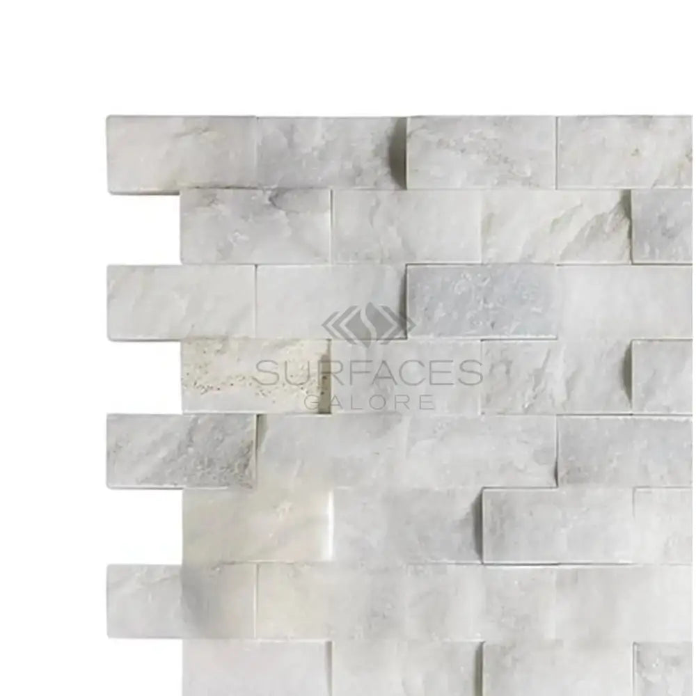 White and gray marble brick wall featuring Calacatta Gold Select mosaic tile