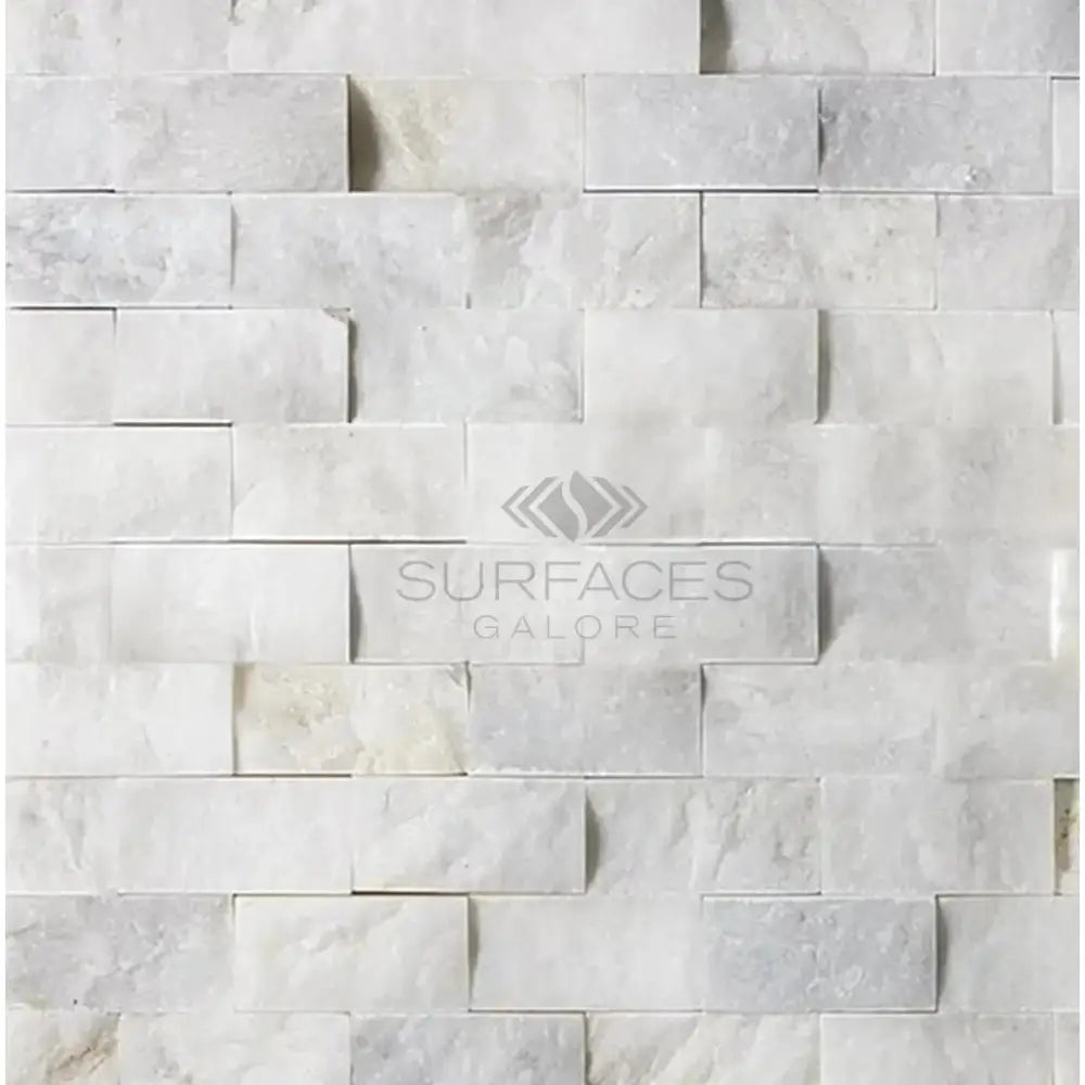 White marble brick wall with Calacatta Gold Select Gold 1X2 Brick Mosaic Tile