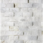 White marble brick wall with Calacatta Gold Select Gold 1X2 Brick Mosaic Tile