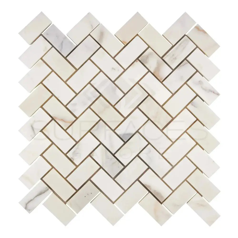 Herringbone marble tile pattern in Calacatta Gold Select Mosaic for elegant flooring or backsplash
