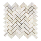 Herringbone marble tile pattern in Calacatta Gold Select Mosaic for elegant flooring or backsplash