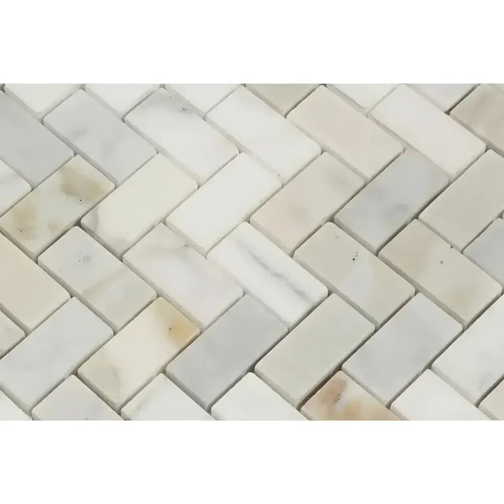 Calacatta Gold Select Herringbone Marble Tile in polished or honed finish