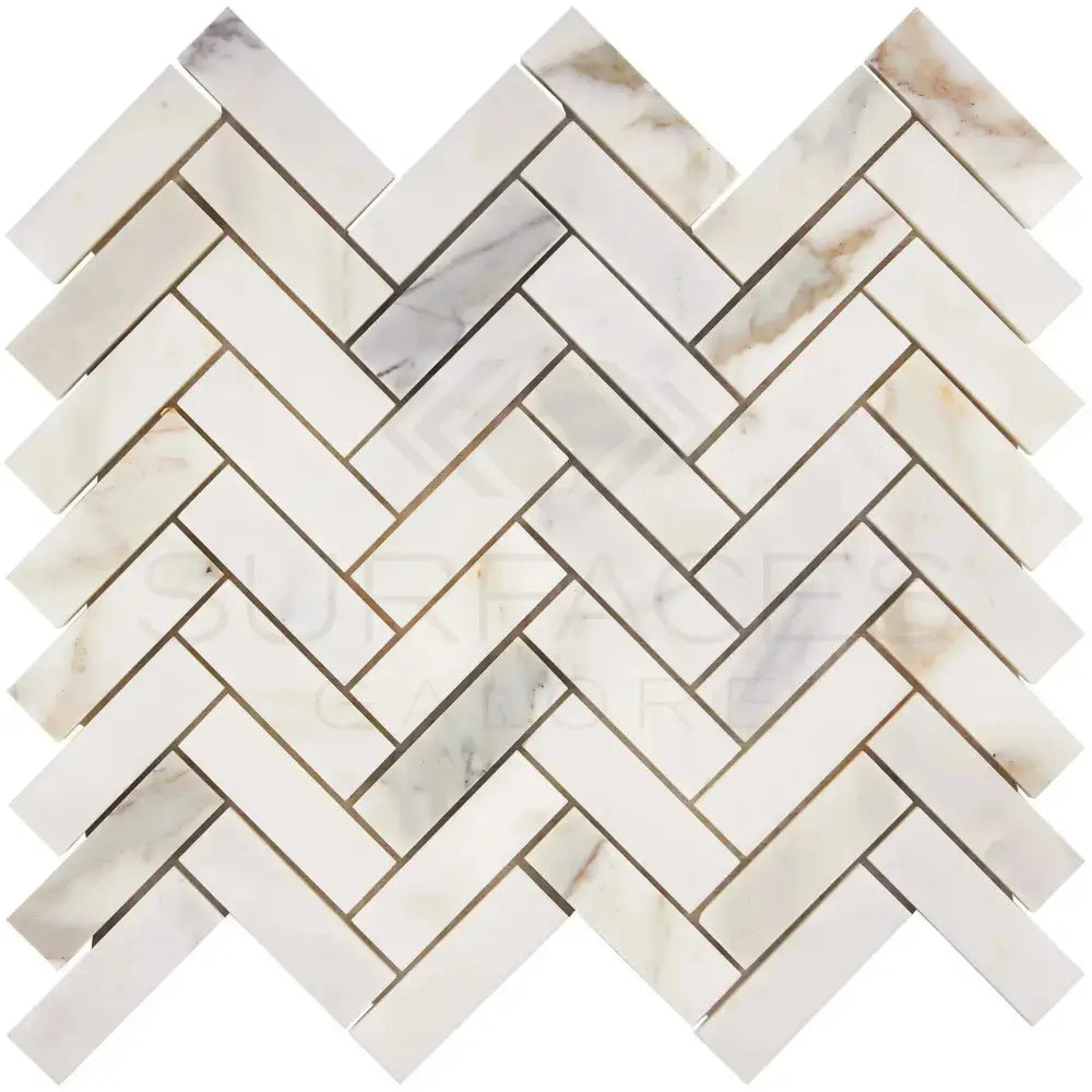 Calacatta Gold Select 1x3 Herringbone Mosaic Marble Tile pattern showing polished or honed finish