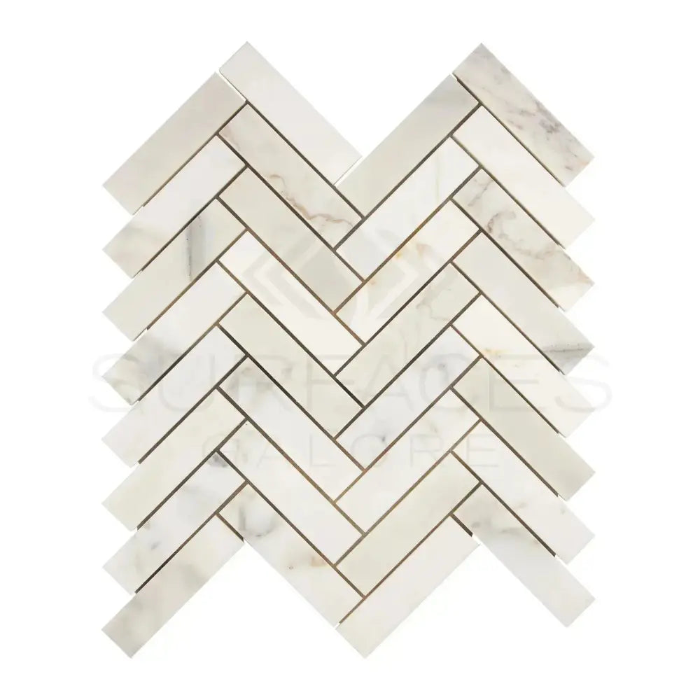 Herringbone marble tile pattern in Calacatta Gold Select 1X4 mosaic for luxurious flooring