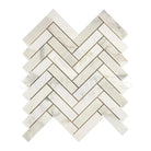 Herringbone marble tile pattern in Calacatta Gold Select 1X4 mosaic for luxurious flooring