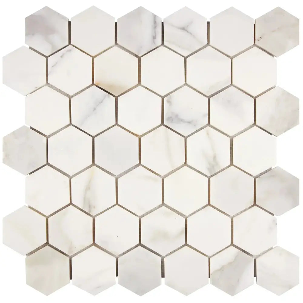 White marble hexagon tile sheet from Calacatta Gold Select 2-inch mosaic marble