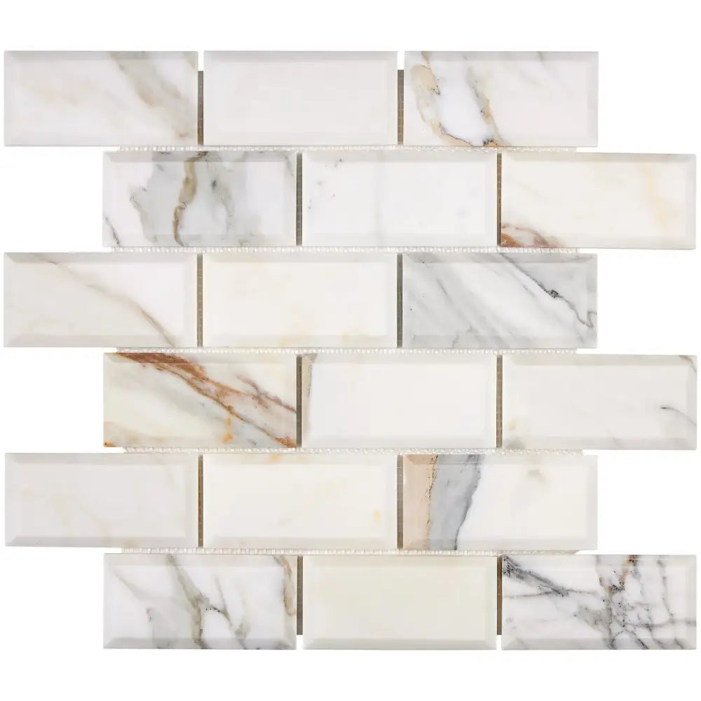 Marble-patterned rectangular mosaic tile from Calacatta Gold Select in polished-honed finish