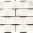 White marble brick wall featuring Calacatta Gold Select Gold 2X4 mosaic marble tile