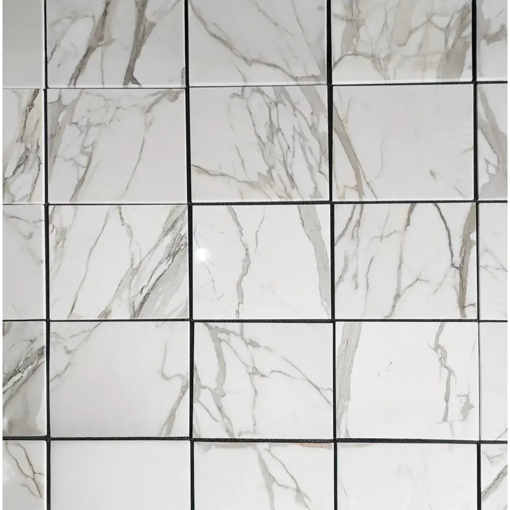 White marble tile grid from Calacatta Gold Select Mosaic Marble Tile collection