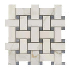 Woven pattern of rectangular Calacatta Gold marble tiles with gray accents in Basketweave Mosaic