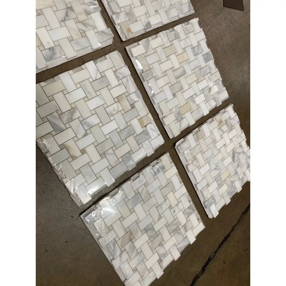 Rectangular Calacatta Gold Select marble mosaic tiles with basketweave pattern for elegant flooring