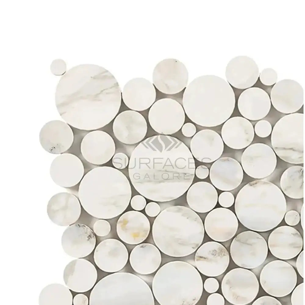 White marble circle mosaic from Calacatta Gold Select with gold bubbles detail