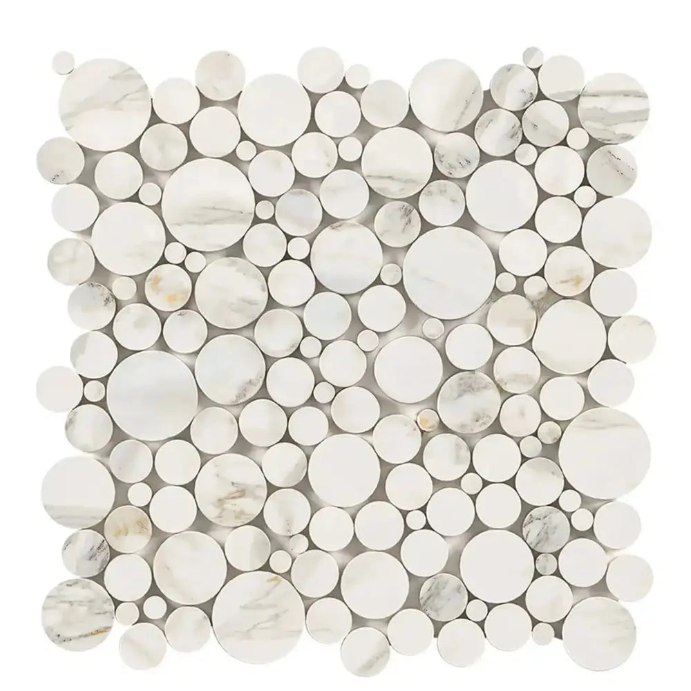 Circular marble mosaic tile from Calacatta Gold Select Gold Bubbles collection