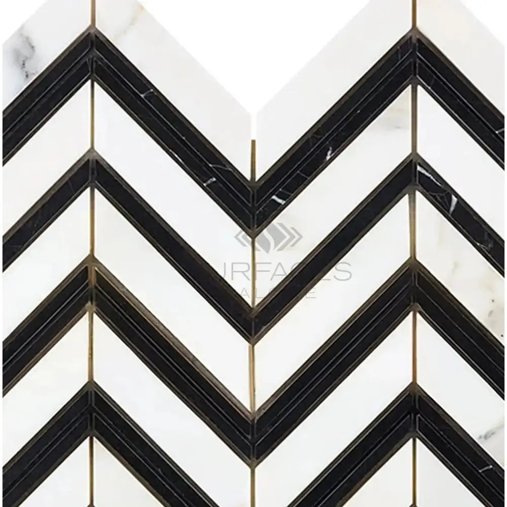 Chevron patterned marble tile in Calacatta Gold with black accents, polished or honed finish