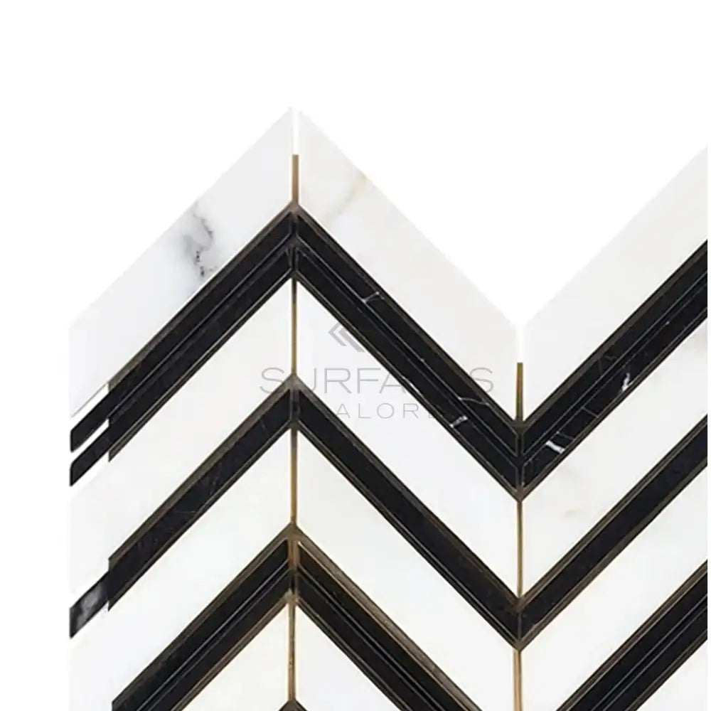 Chevron patterned Calacatta Gold marble tile with black accents, polished or honed finish