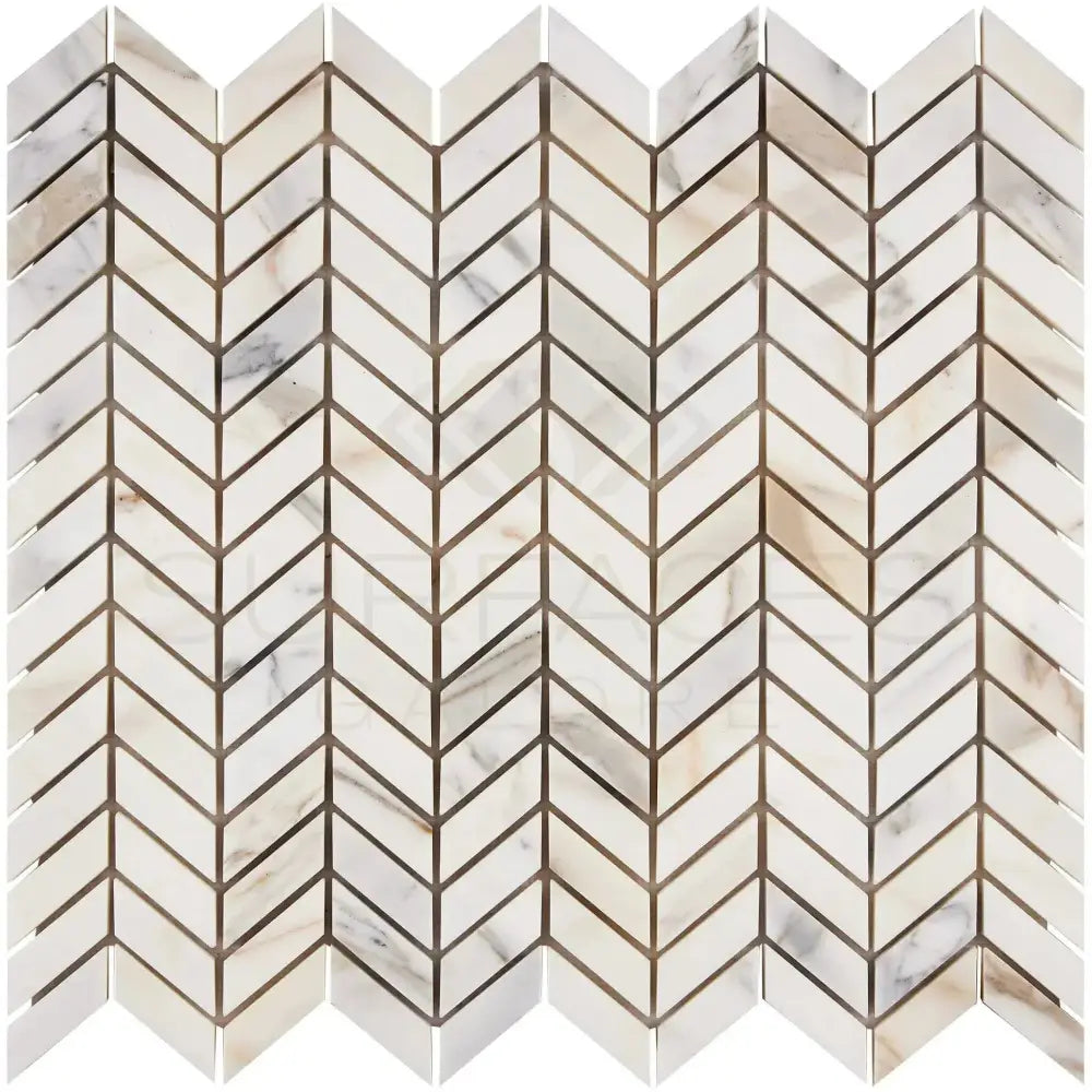 Chevron pattern marble tile in Calacatta Gold Select for elegant interior design