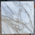 Square Calacatta Gold Select marble tile with gold veining in 12x12 polished or honed finish