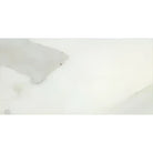 Creamy marble-patterned surface from Calacatta Gold Select Gold Marble 12X24 tile
