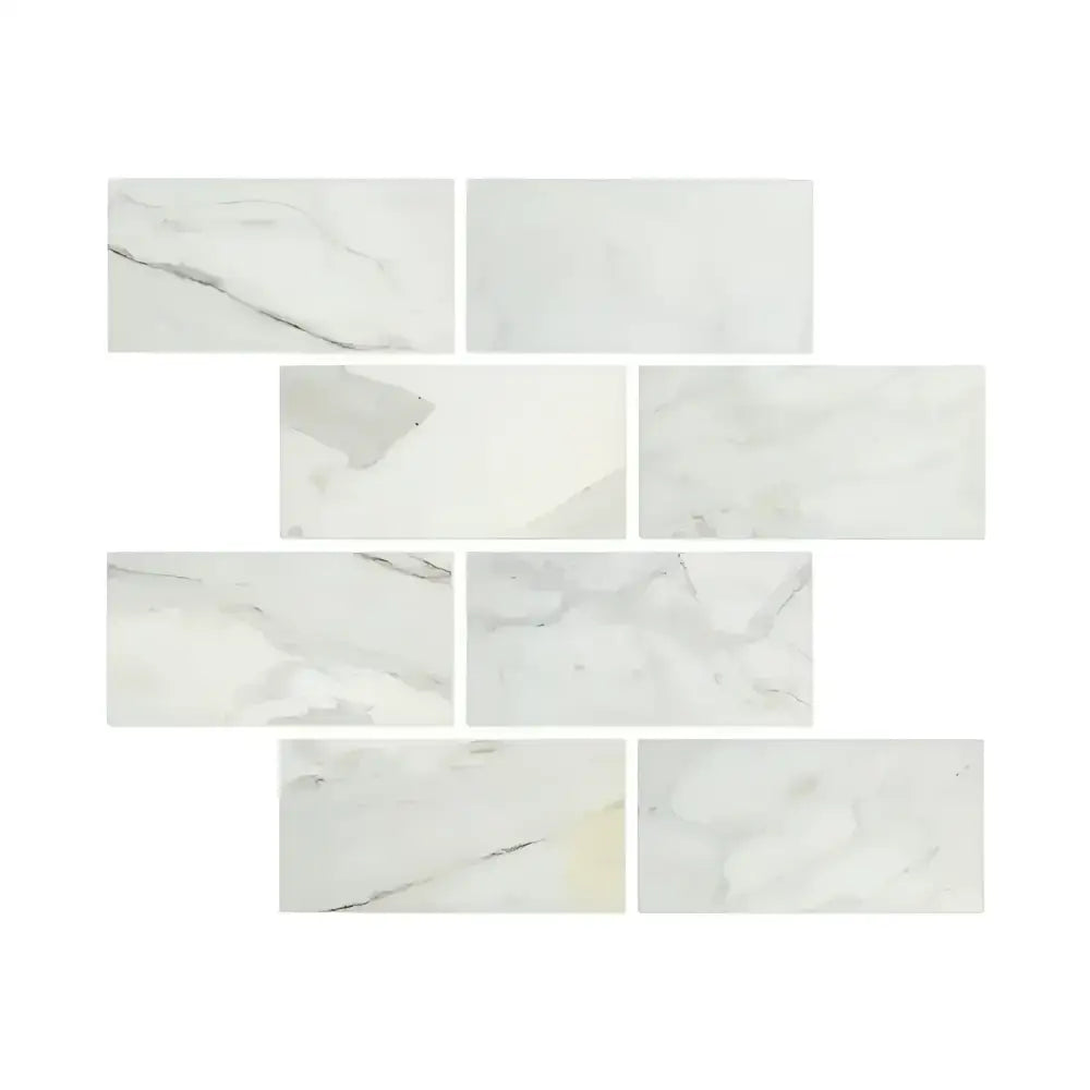 Calacatta Gold Select Gold Marble 12x24 rectangular tiles with elegant marble pattern